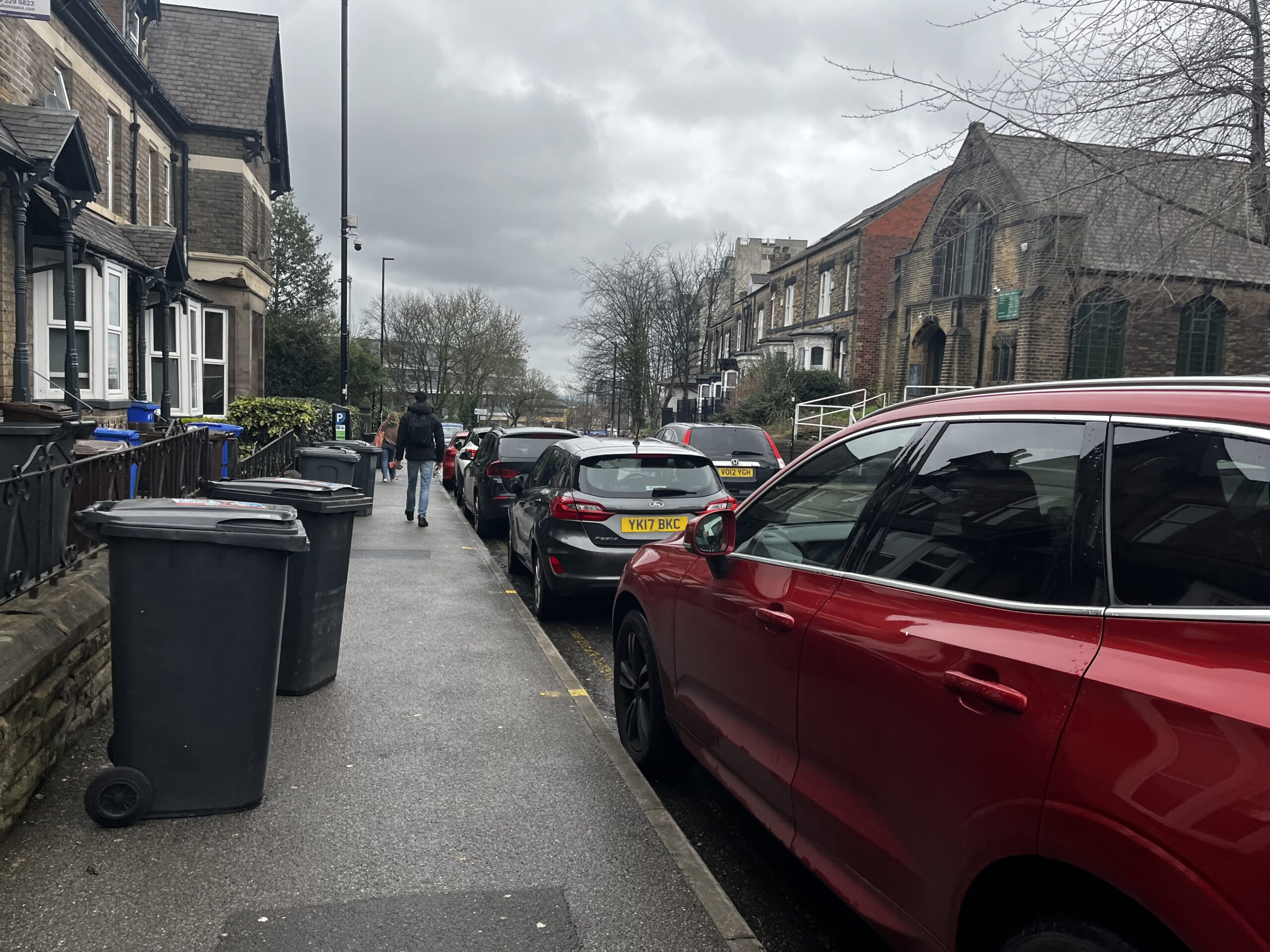 Cars parking on the road in Sheffield