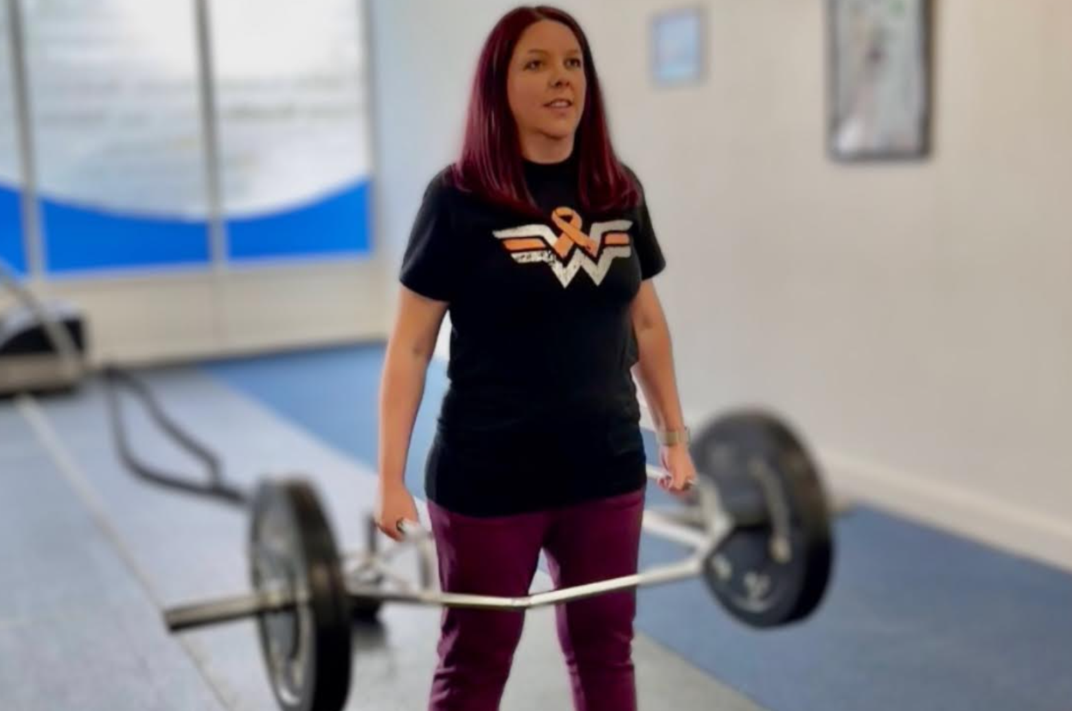 Joanna Mason, Volunteer Group Coordinator of the MS Society Sheffield and Rotherham Group lifting weights.