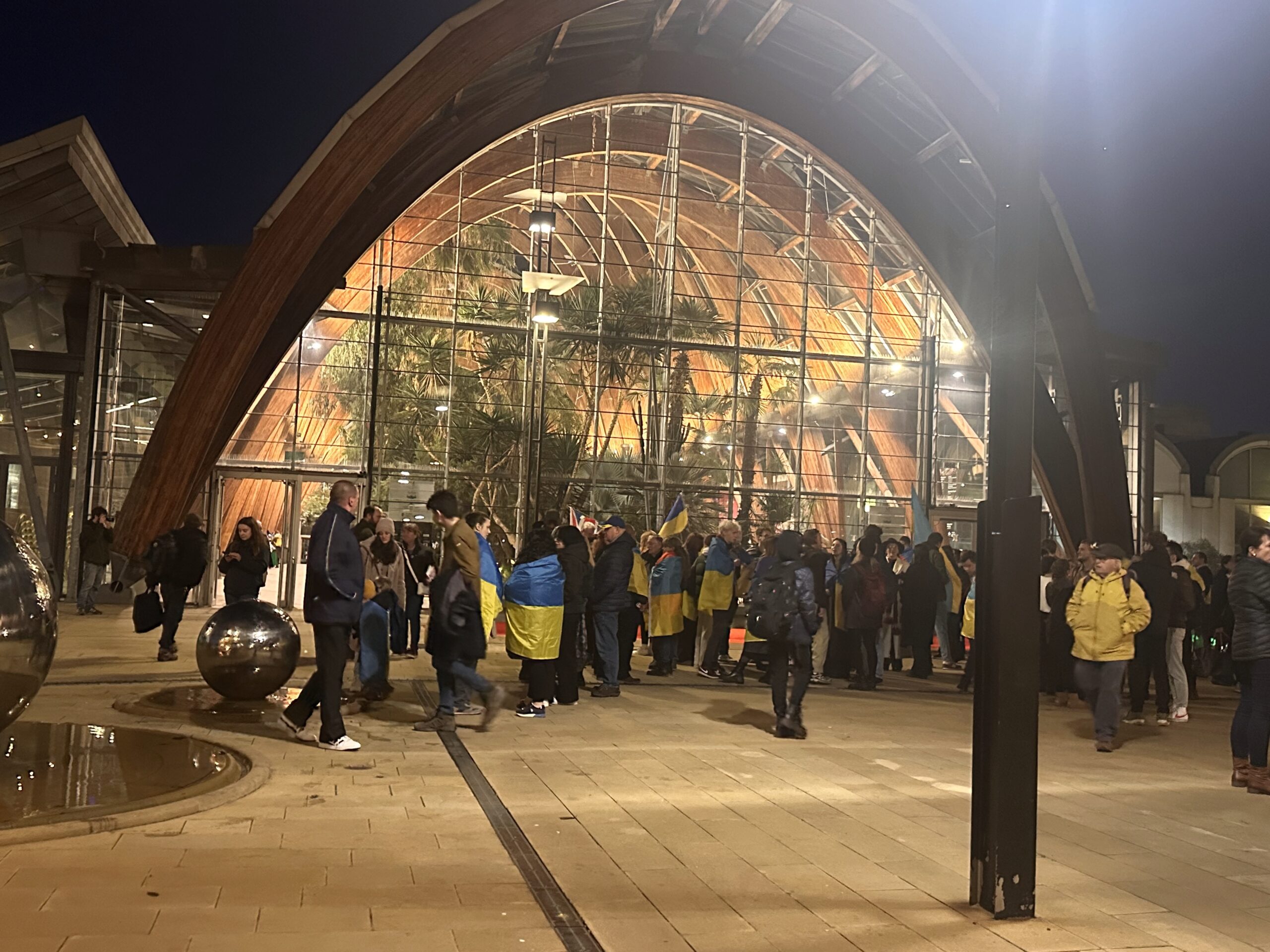 IMG_8814 Support gathers outside the Sheffield Winter Gardens at night.