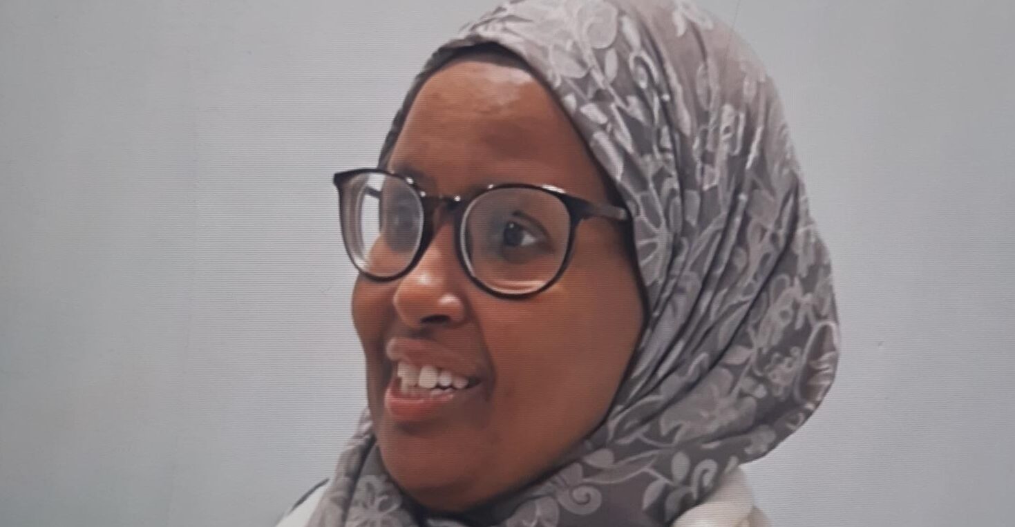 A picture of missing woman Ramla who is described as is described as black and of slim build. In the picture she is wearing a headscarf and glasses.