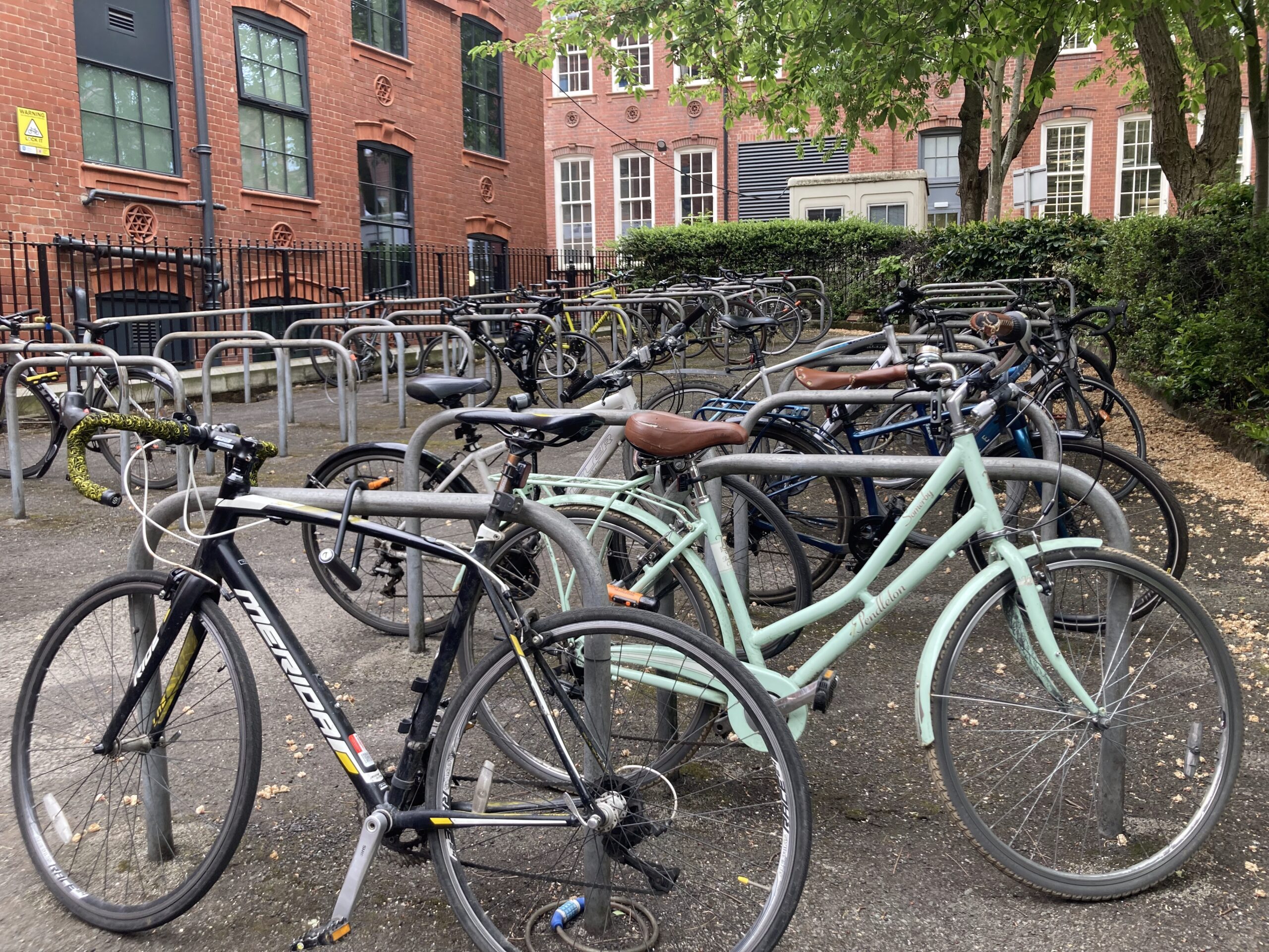 Lots of bikes locked up in bike racks
