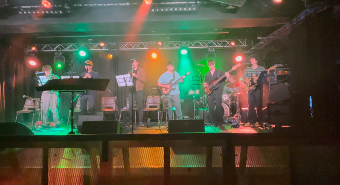 FriNJE band (Music Player's Society) performing on stage