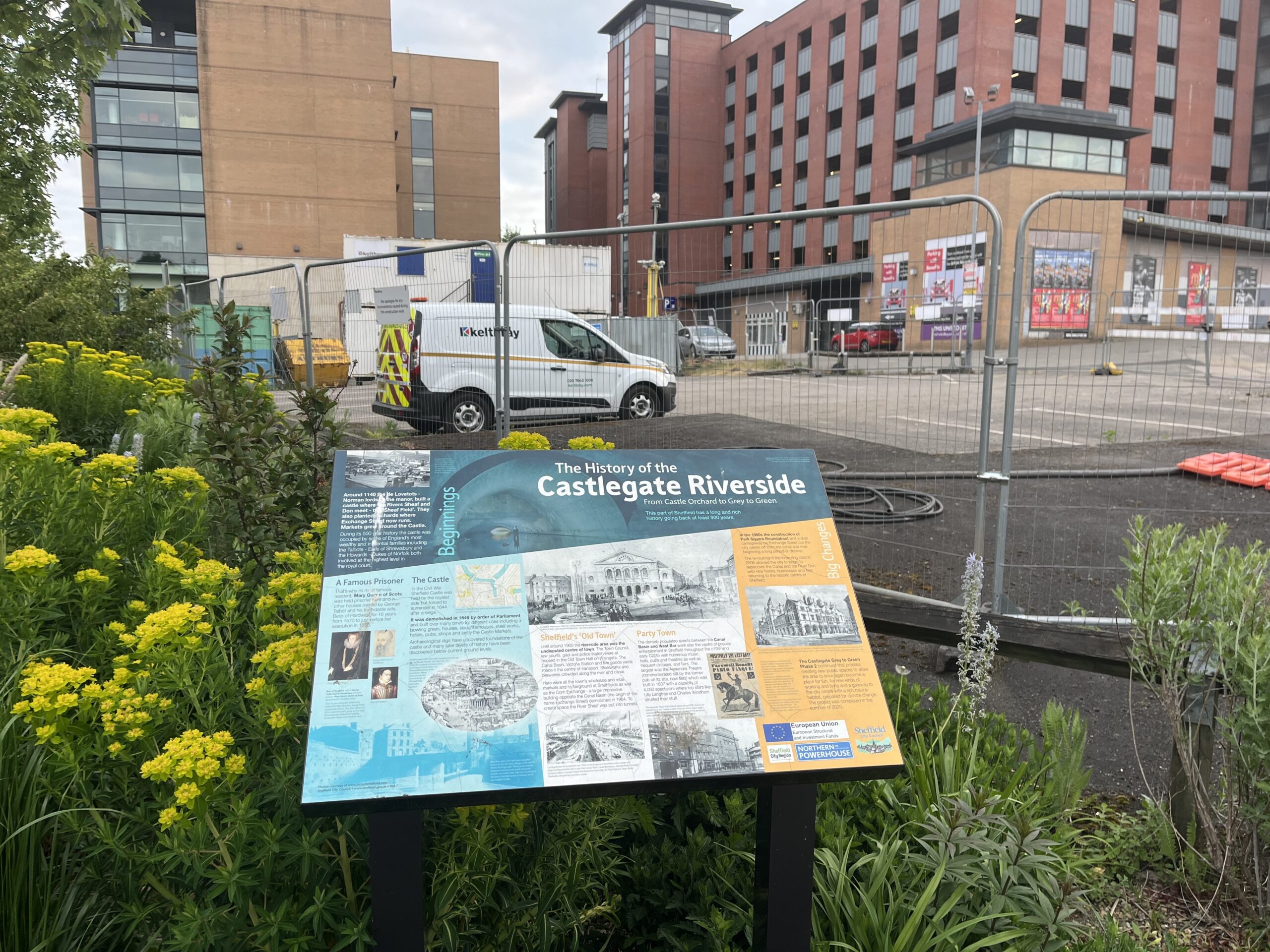 Photo of a story board explaining the history of the Sheffeid Castle remains site, outside of the site of the Castle