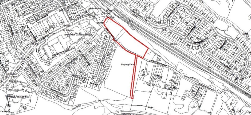 Map showing the red boundary of the proposed housing development site on Junction Road in Woodhouse, Sheffield.