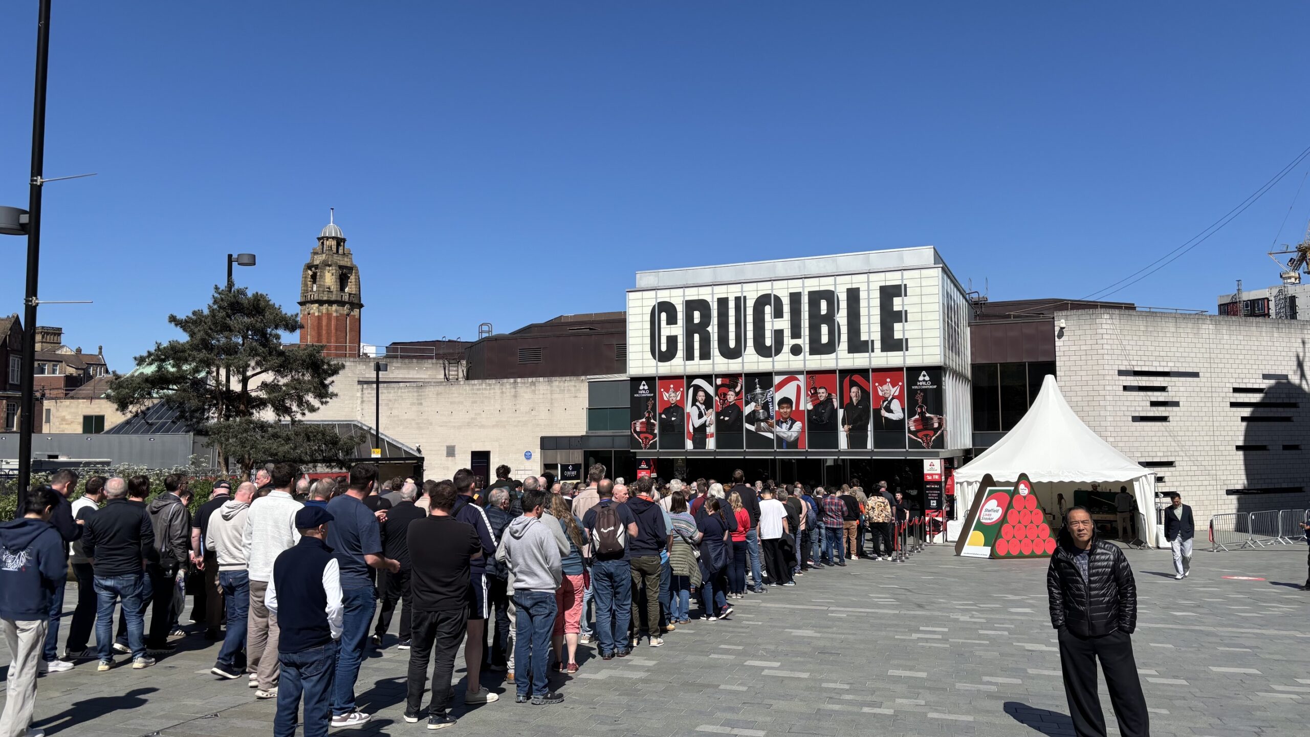 Shows the popularity of the Snooker World Championship in Sheffield as large crowds form outside the Crucible.